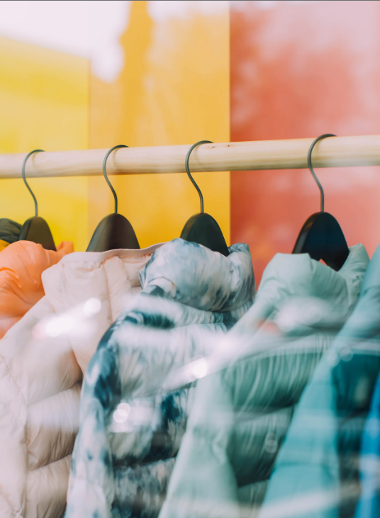 shop fitting clothes on hanger